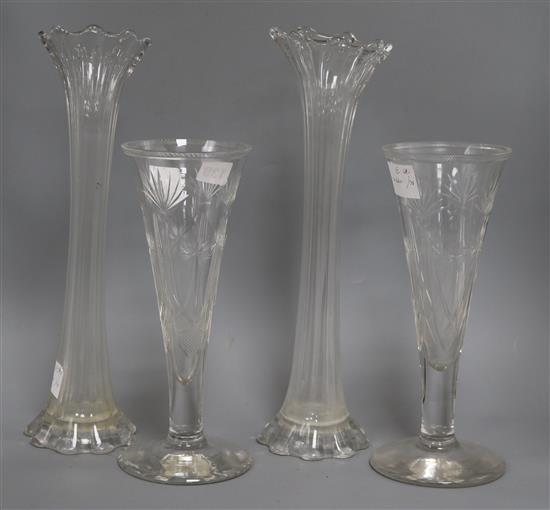 A pair of tall fluted cut glass vases and a pair of cut glass trumpet vases tallest 41cm